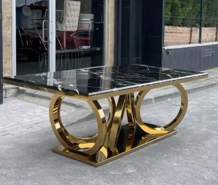 Siyah mermer tablalı, parlak gold kaplamalı halka gövdeli orta sehpa